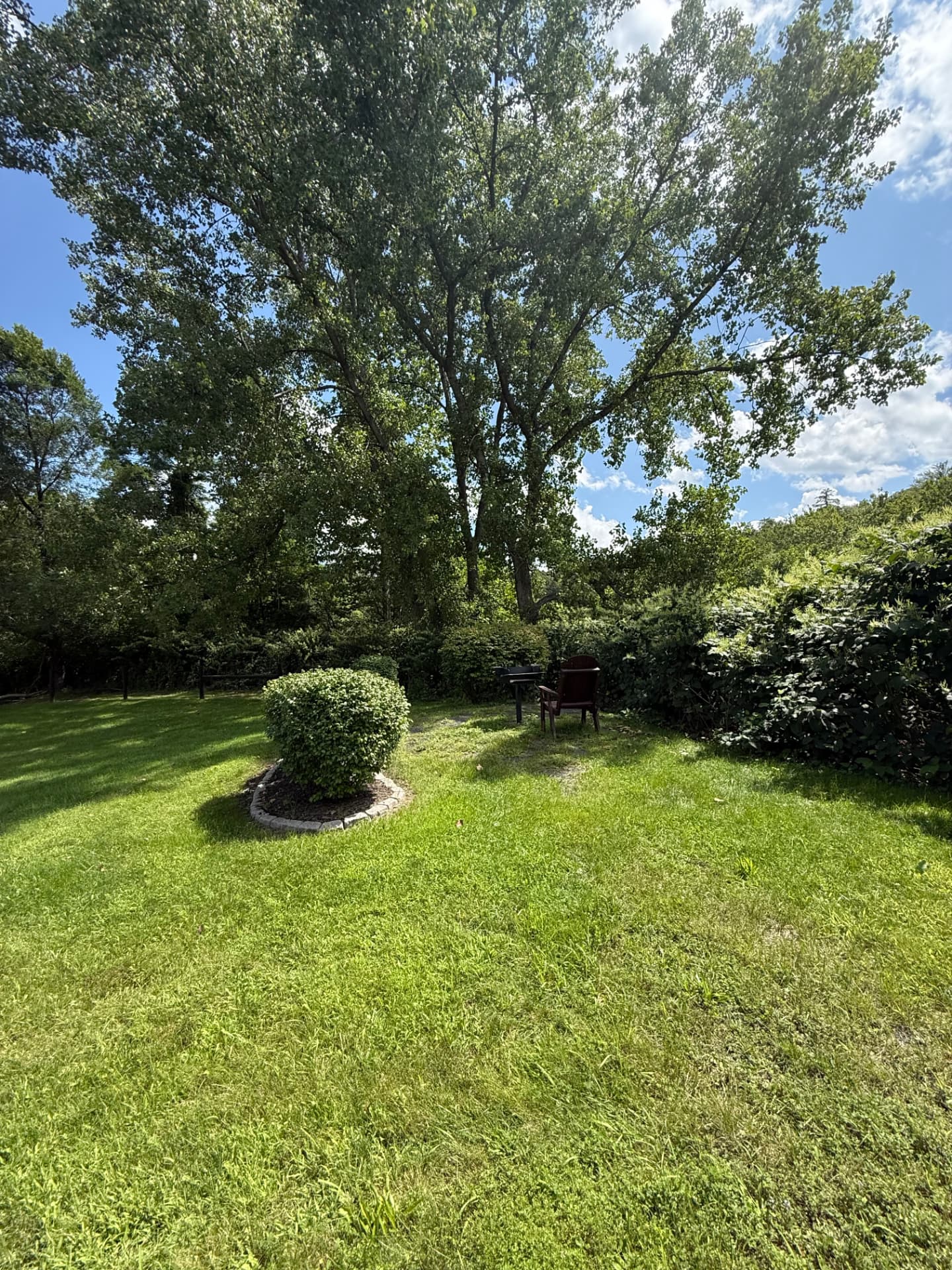 Open green space and lawn across the Tuscany Meadows community