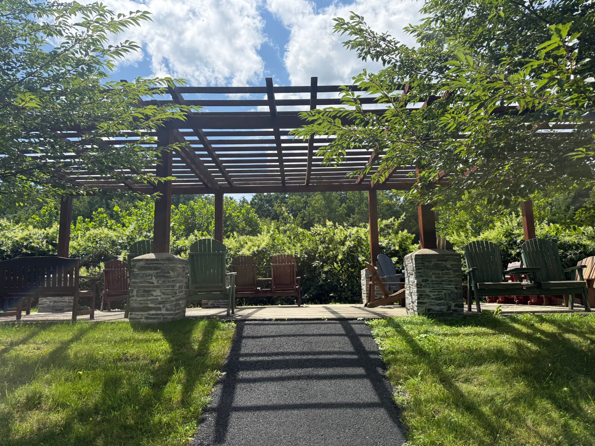 The community pergola and seating area at Tuscany Meadows