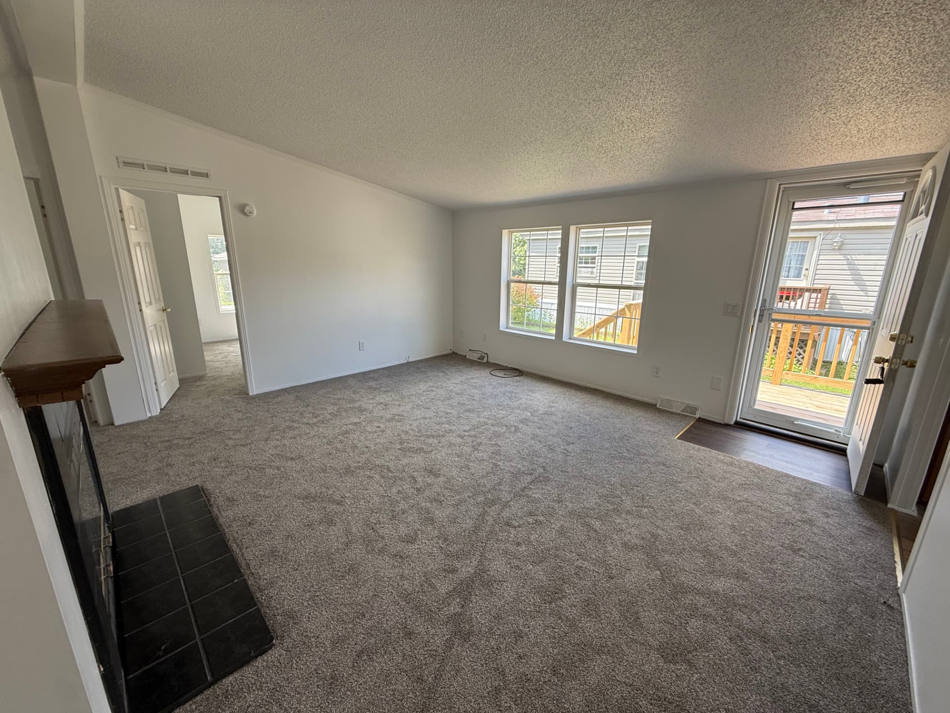 The living room at 40 Michael with a vaulted ceiling