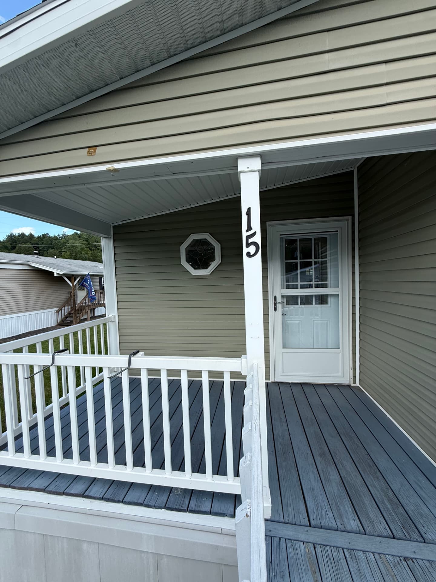 The deck and lawn behind 15 Kevin Lane