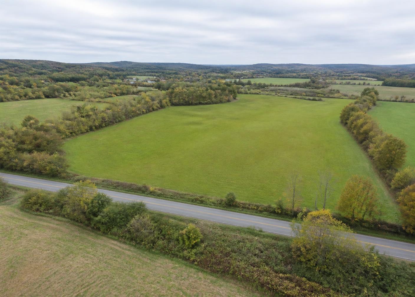 Aerial view of road frontage along open land